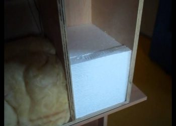 Comparing insulation types for a wooden house construction