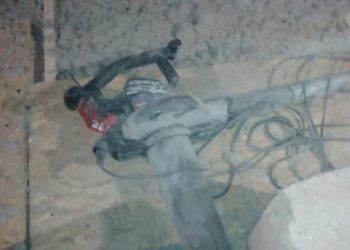 Blowing insulation with a leaf blower