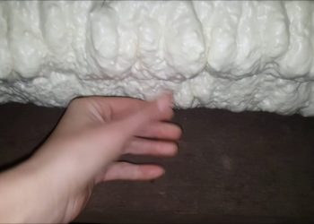 Spray Foam Vertical Nozzle applying overhead ceiling insulation basement ceiling