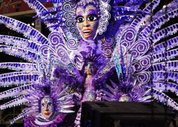 Caribbean carnival performers take stage to fight COVID disinformation